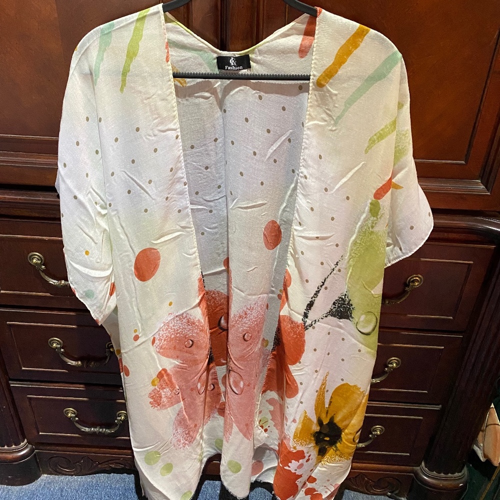 Beautiful brand-new  cover-up